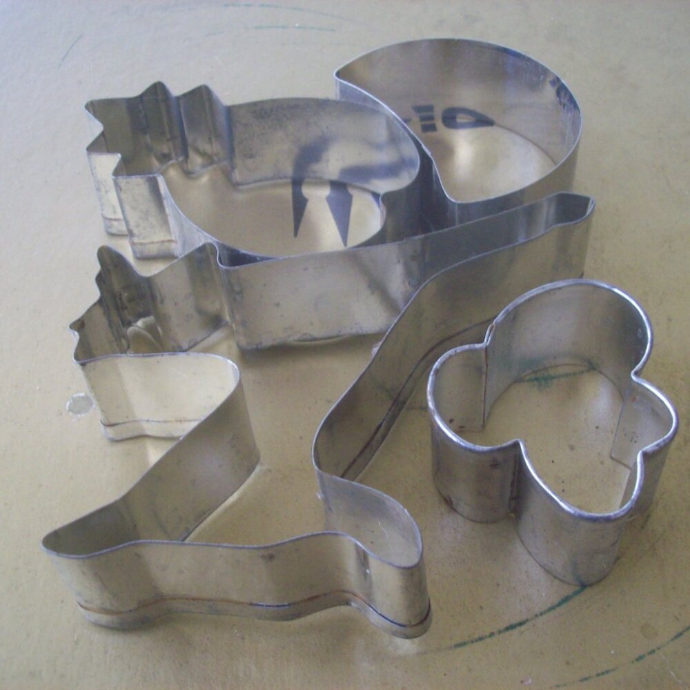 Vintage Metal Cookie Cutters Lot of 4 Reindeer Pineapple Half Moon and Cloud
